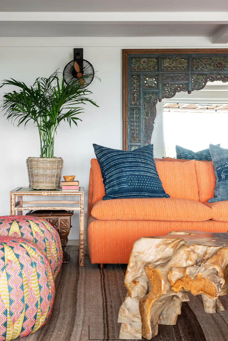 Earth-toned room with diverse fabric and material textures creating depth and warmth