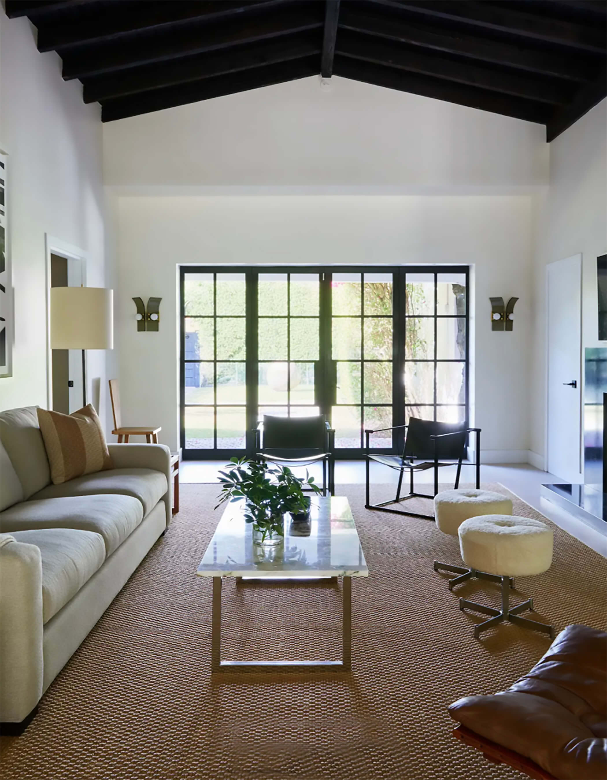 Black-brick fireplace with built‑in shelves